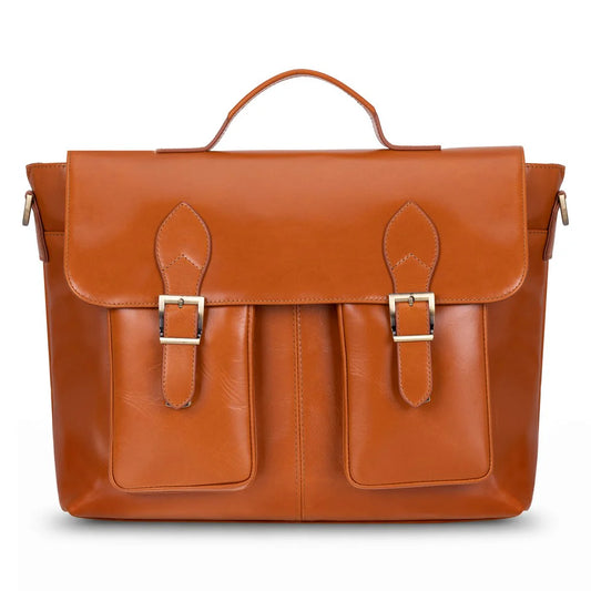 A cognac brown leather briefcase with a top handle, two front flap pockets with gold-tone buckle details, and a shoulder strap, shown against a plain white background.