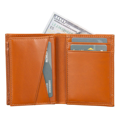 Brown leather wallet with money and cards on a white background
