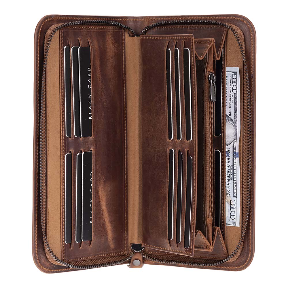 An open brown leather zip-around wallet with multiple card slots, bill compartments, and a pen loop, shown on a plain white background.