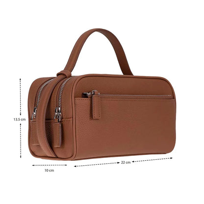 A brown pebbled leather toiletry bag with a top handle, shown with dimension markings of 13.5 cm height, 22 cm width, and 10 cm depth on a white background.