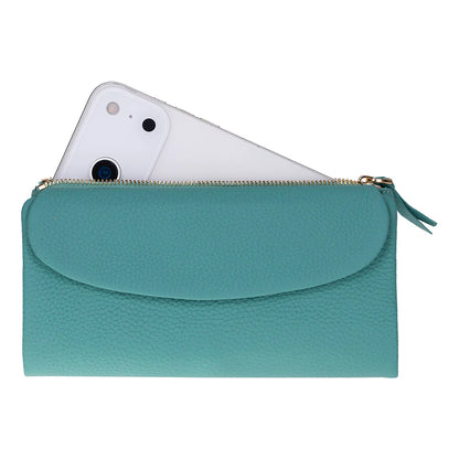 Teal clutch with a phone inside on a white background